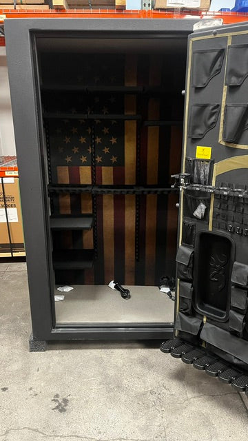 View of the safe with the door open. It has eleven adjustable shelves. A power source in the inside and predrilled bolt down holes. 