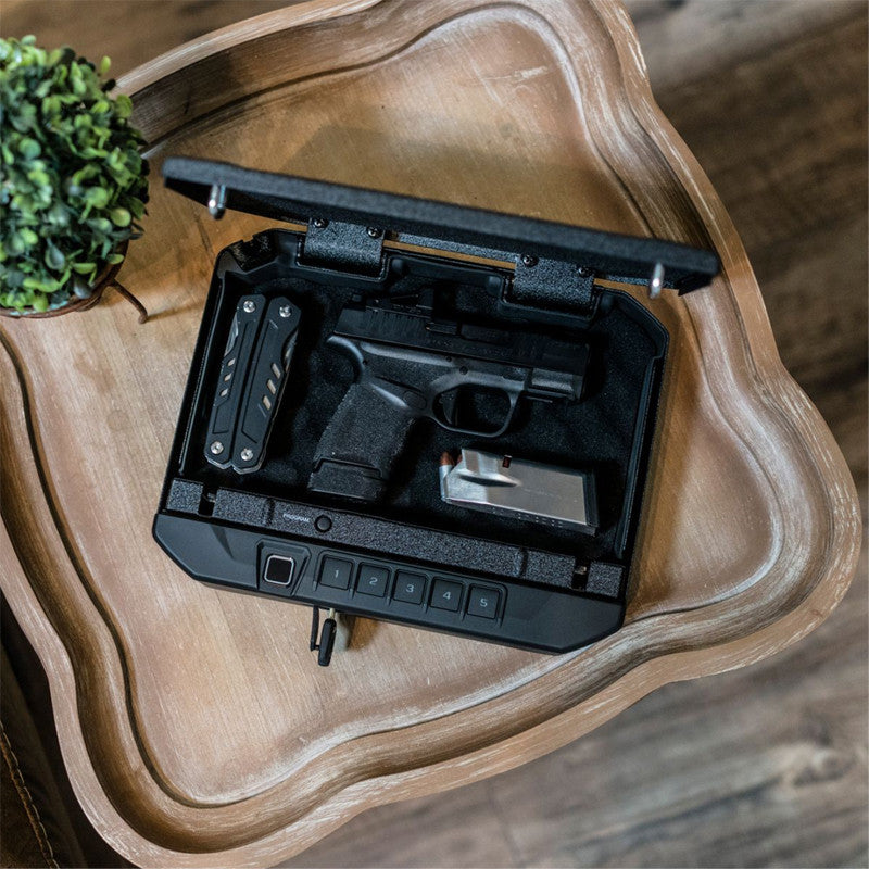 Vaultek V10i 10 Series Essential Biometric Handgun Safe Door Open on Table with Handgun inside