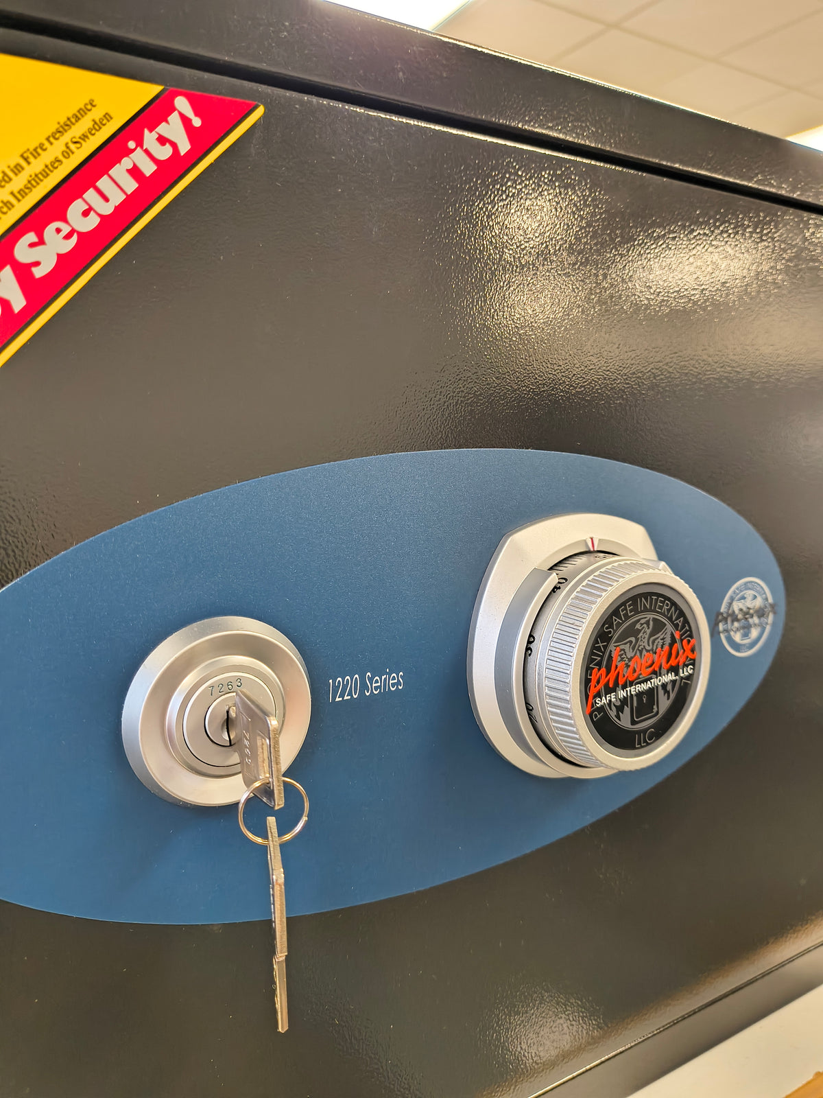 Blemished Phoenix 1221B key and dial lock. 