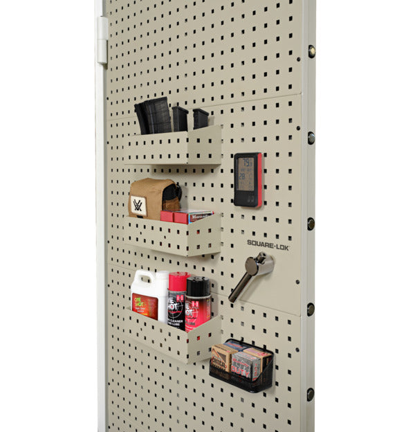 Square-Lok pegboard panel with magazine holders, ammo tray, digital hygrometer, and cleaning supplies mounted on door