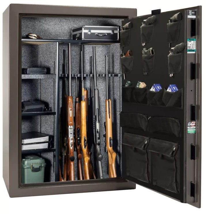 Liberty Safe 1776 50-Gun Safe with door open showing rifles in rack, aluminum case, hard drives, ammunition can, pistol, books, and valuables on shelves, with Liberty-branded canvas door panel storing pistols and documents