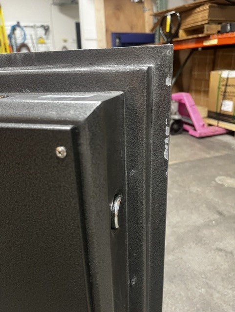 The door has a few chips on the back of the door edge. 