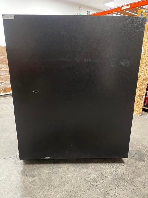 View of the back of the safe. The back is a little dirty but no damages on the backside. 