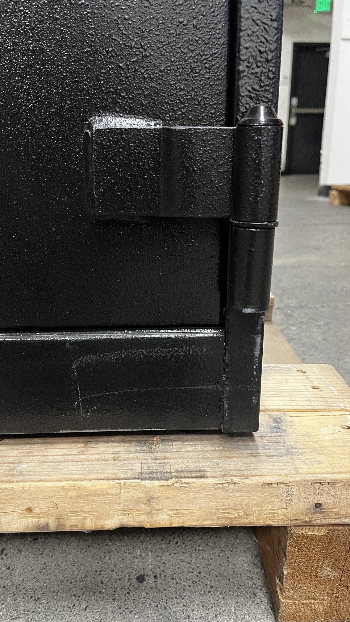 Close-up of the scratches on the lower right side of the safe. 