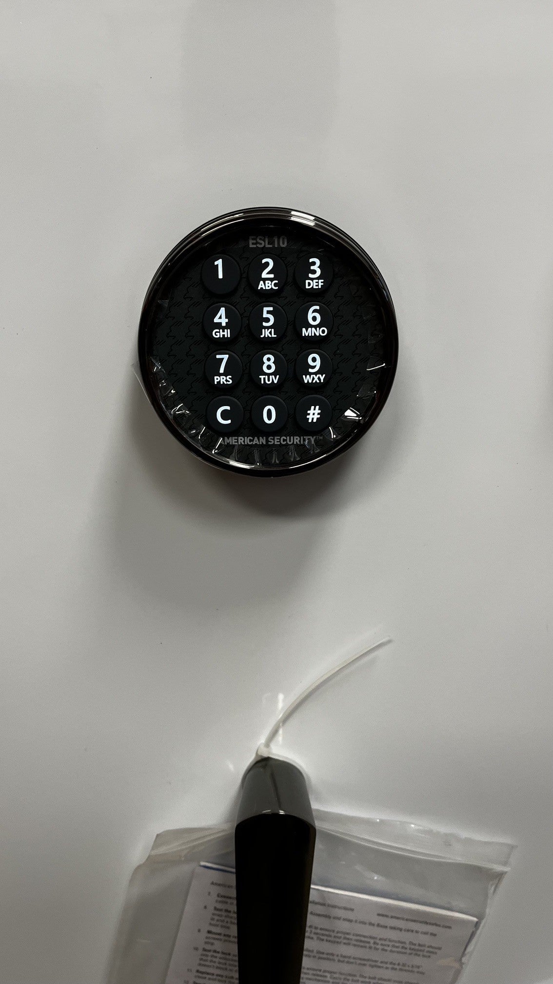 Close up view of the ESL10 digital lock. The digital lock is backlit. 