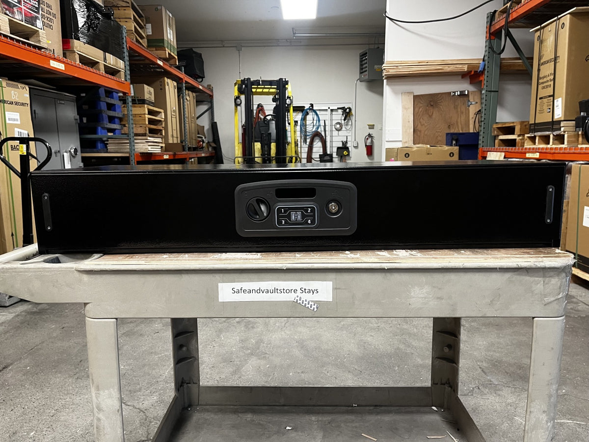 Front view of the safe. It has a digital lock. You can access the safe with a code, backup keys, and RFID scanner. 
