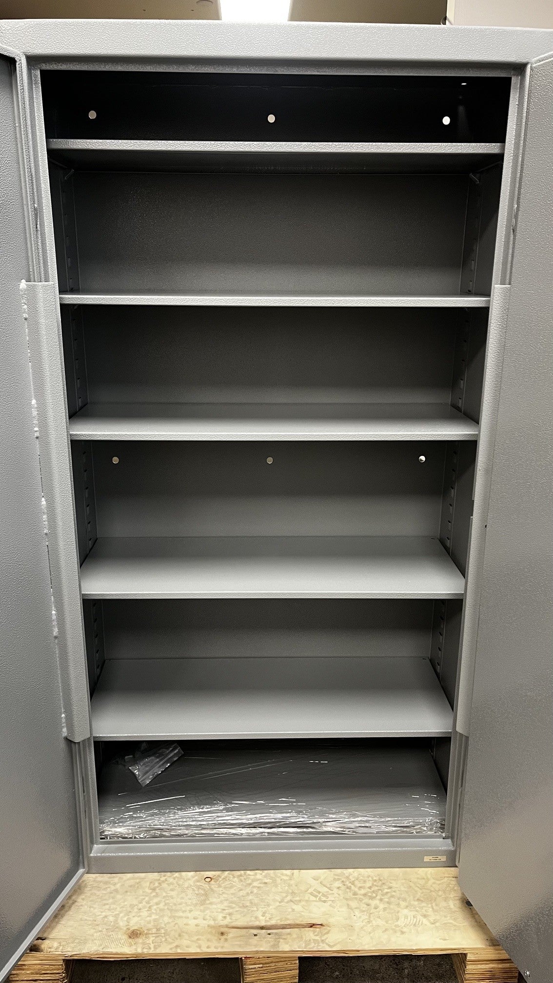 close-up view of the inside of the safe. The safe has a total of 7 adjustable shelves.  