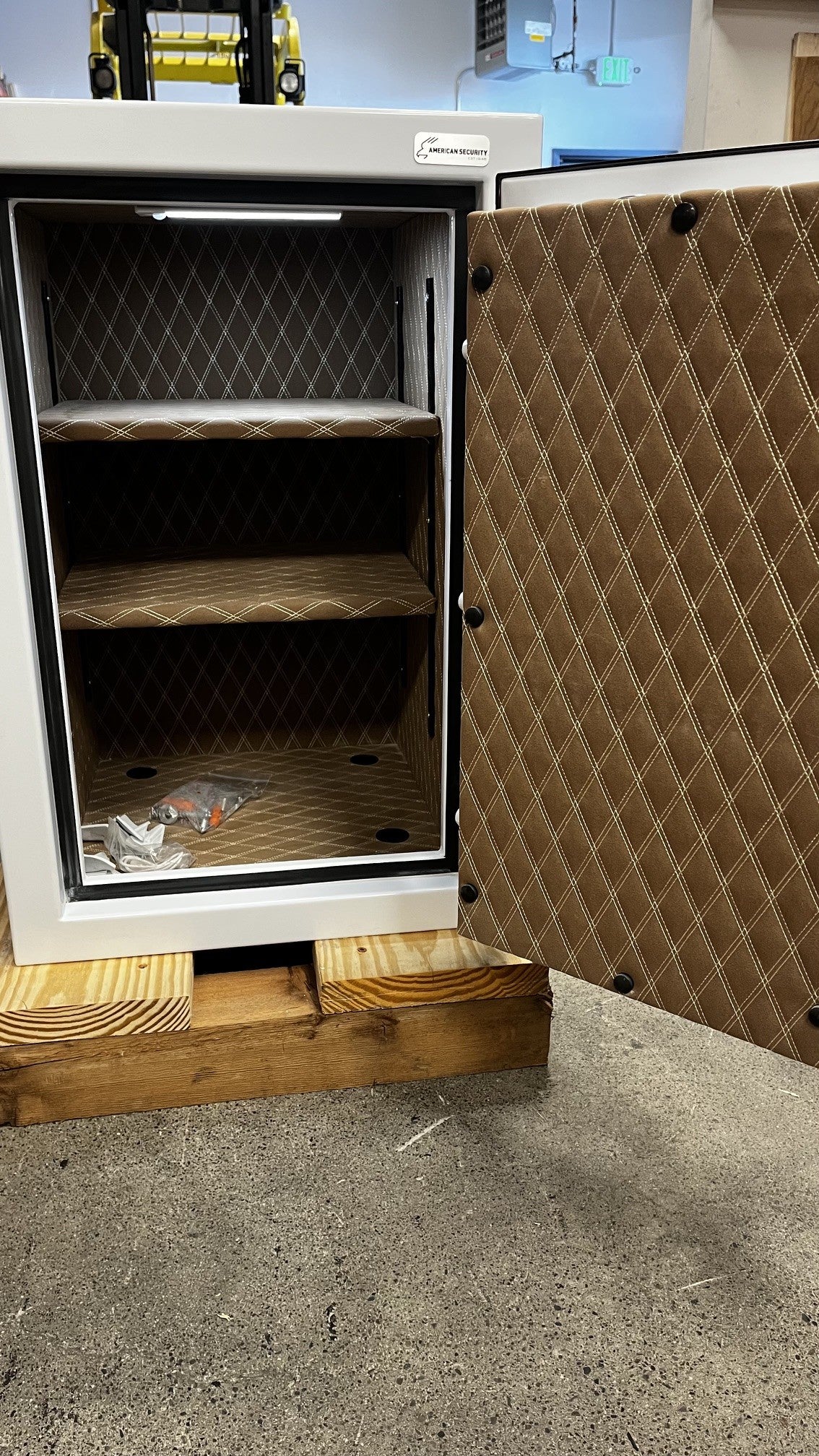 View of the safe with the door opened. The safe comes with one LED light that has the option to always be on or to be on motion senser mood. The light kit is rechargeable. 