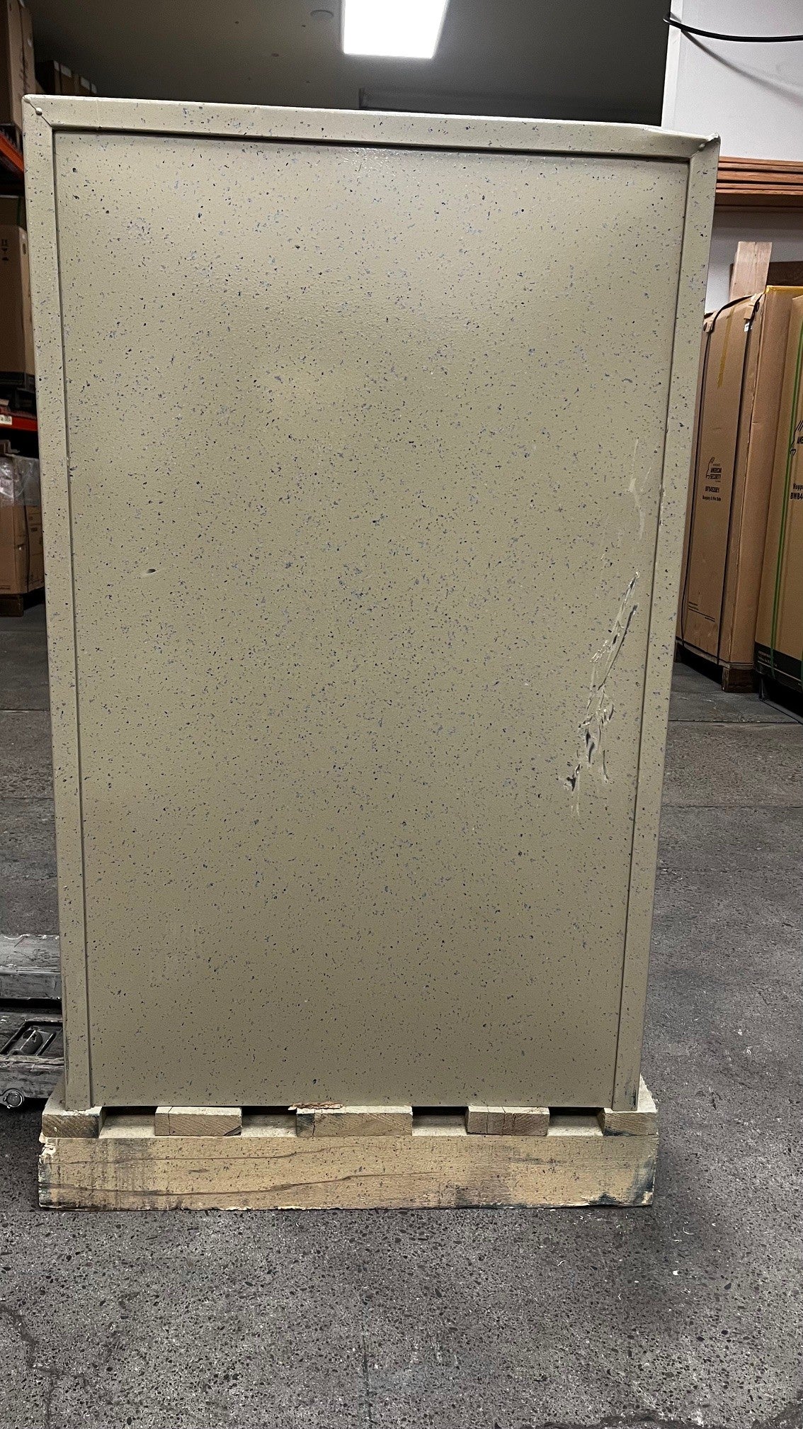 Back view of the safe, the safe has some scratches.