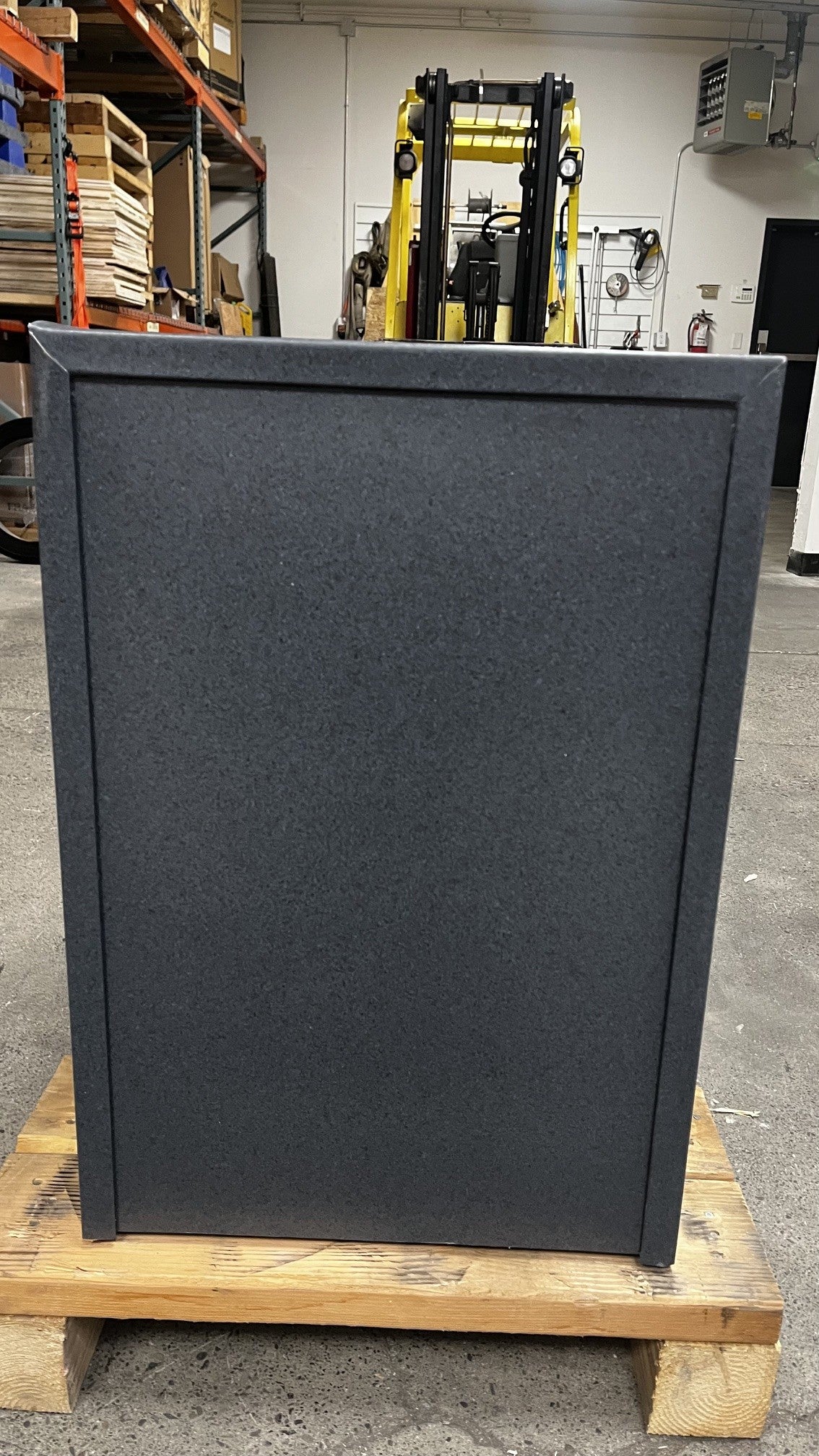 Back view of the safe, the top left corner has a small crack on it. 