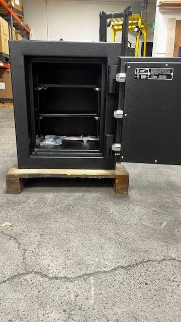 View of the safe with the door open at 180 degrees. The safe comes with 2 adjustable shelves. 