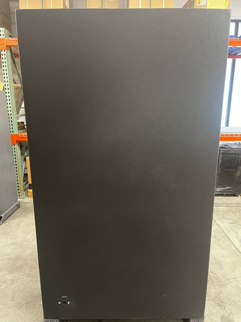 View of the back side of the safe. The lower left side has an outlet to connect a power cable onto the safe. 