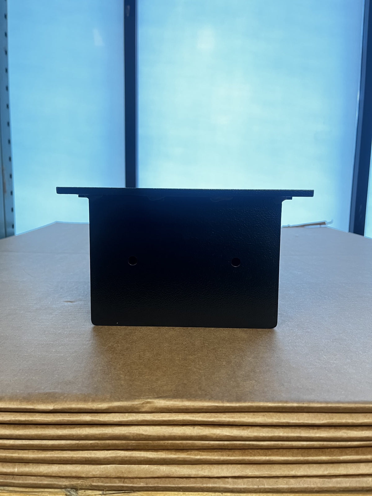 View of the right side of the body, it has two predrilled holes. 