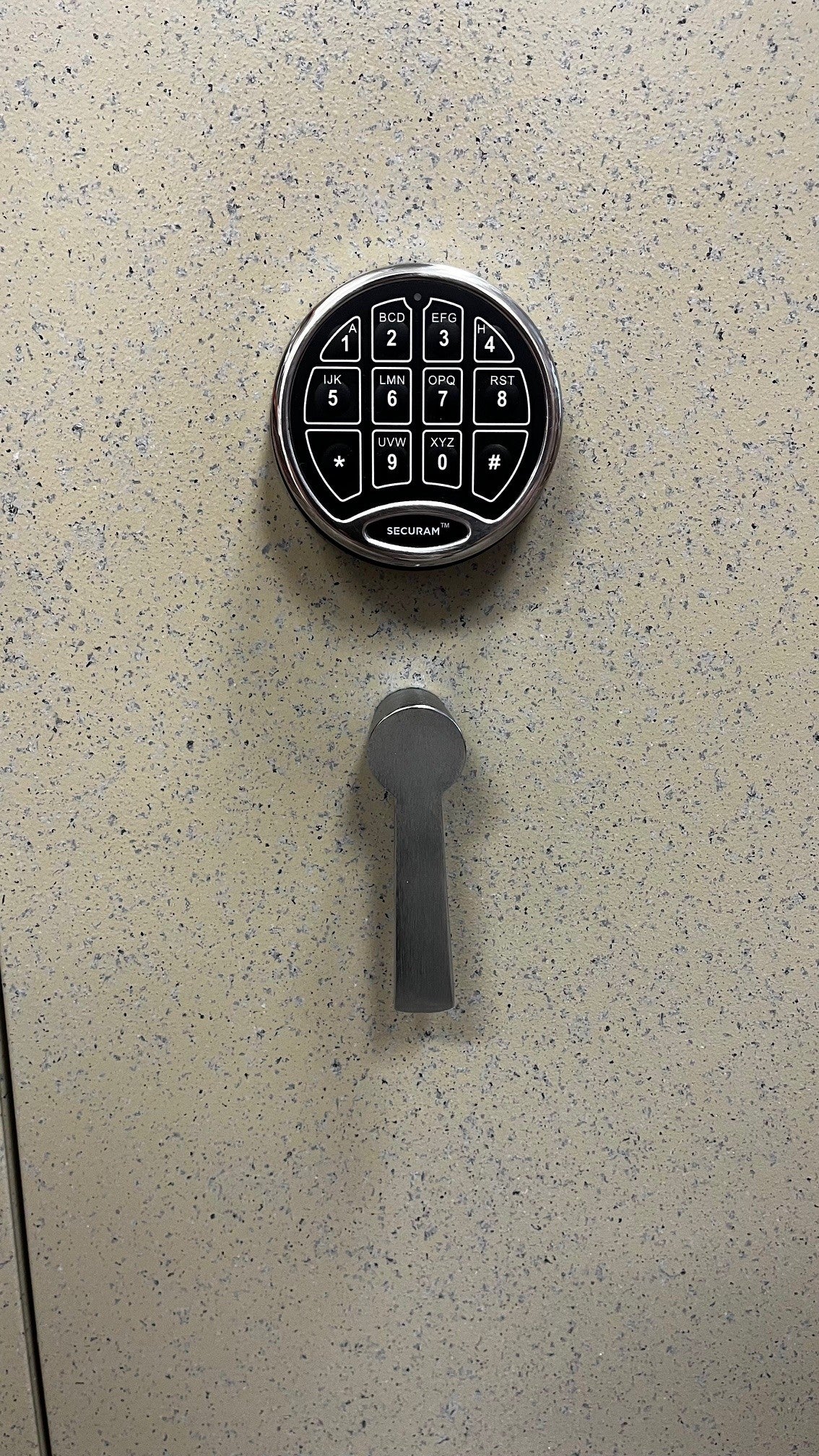 Close-up of the sliver handle and digital keypad.