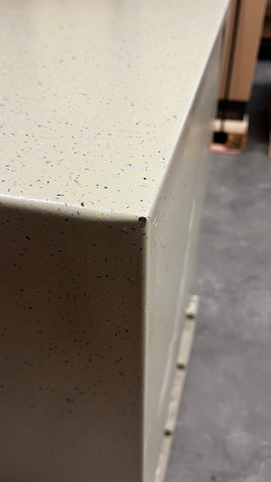 Small scratch on the top edge. 