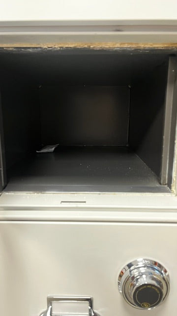 View of the inside of the top drawer. 