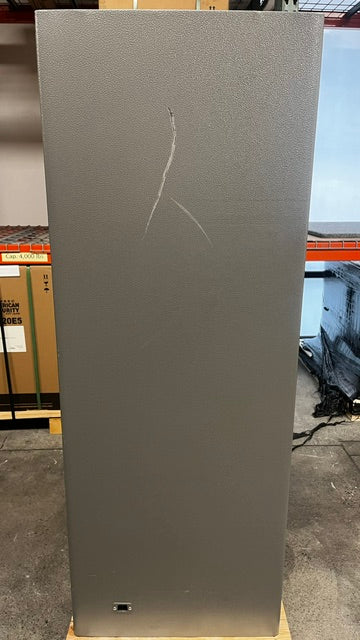 View of the back of the safe. The safe does have two big scratches on the paint. 