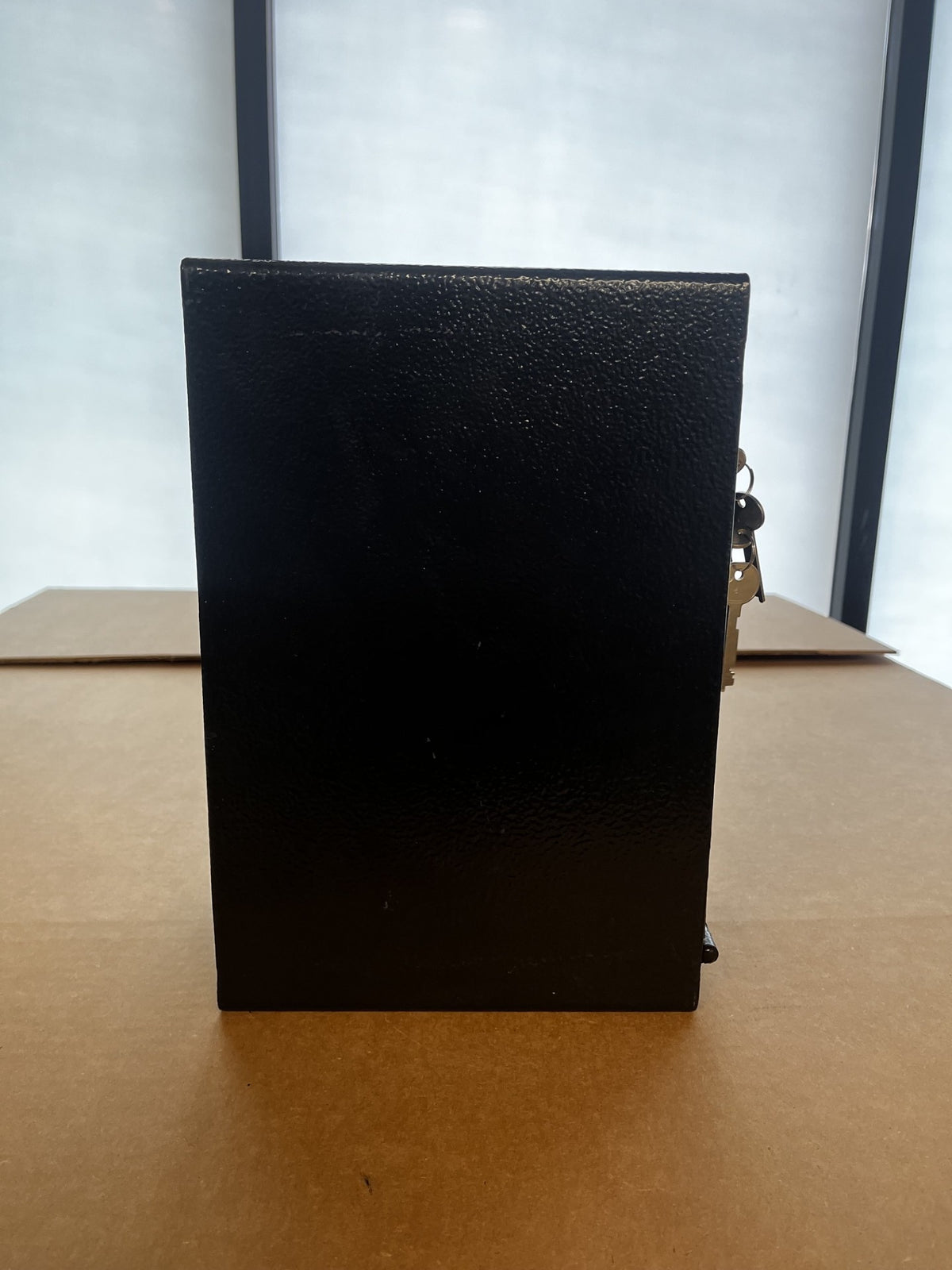 View of the left side of the safe. 