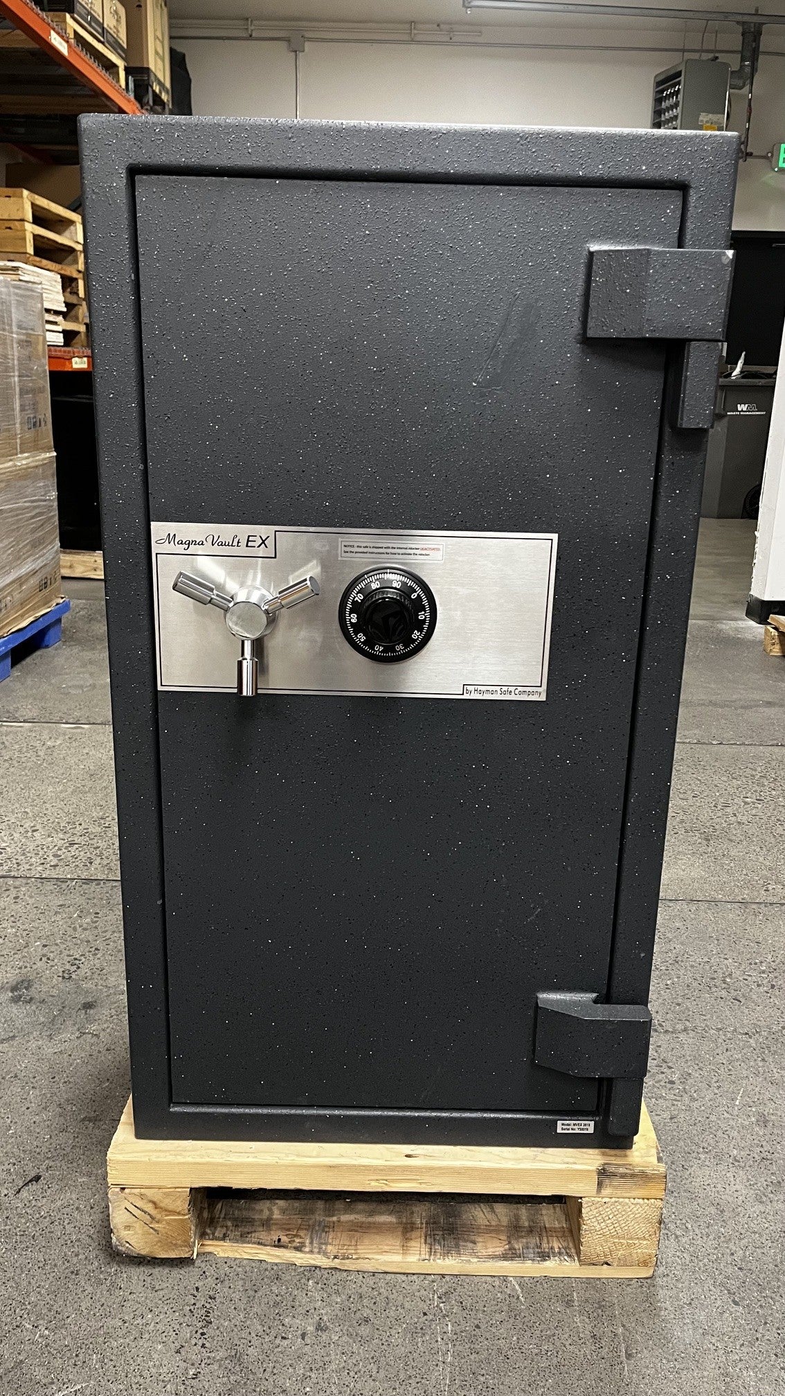 Front view of the safe. The right hinge on the top has a small chip on the paint. 