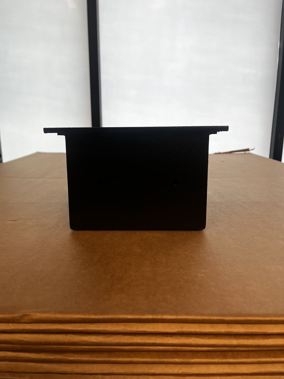 View of the left side of the body, it has two predrilled holes. 