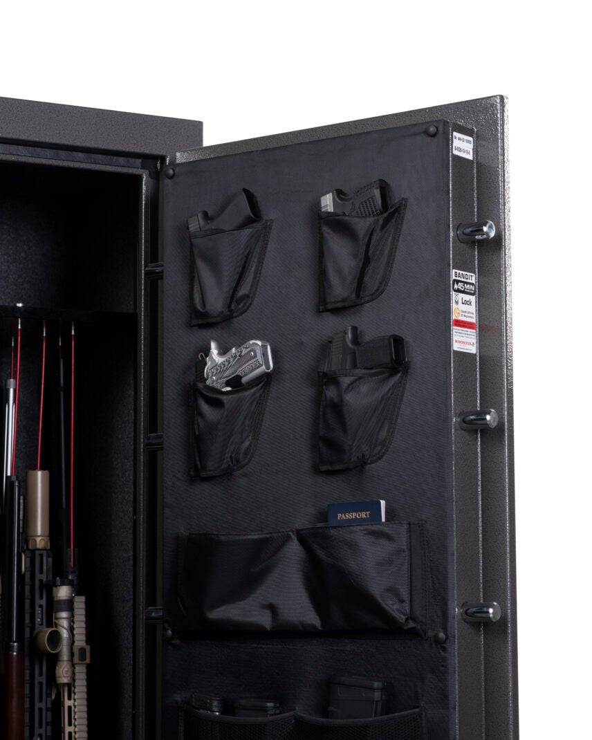 Winchester Bandit 19 door panel organizer with handguns in holsters, passport in pouch, and locking bolts protruding