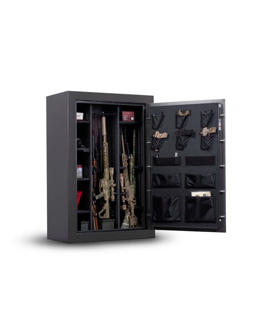 Winchester Bandit 31 door open with long guns on GunStiXX, pistols on door panel organizer, and ammo on side shelves