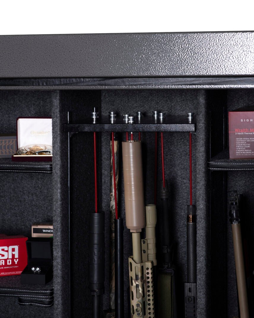 Winchester Bandit 31 GunStiXX rack top plate holding red rifle spacers over suppressed rifles and ammo on side shelves