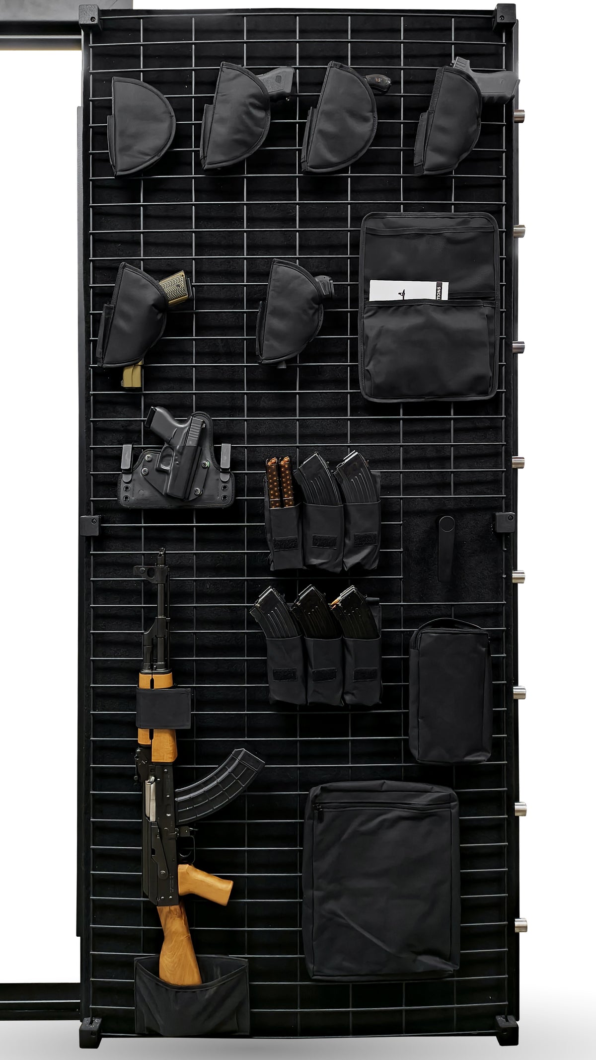Black tactical gear and weapon on a grid display stand