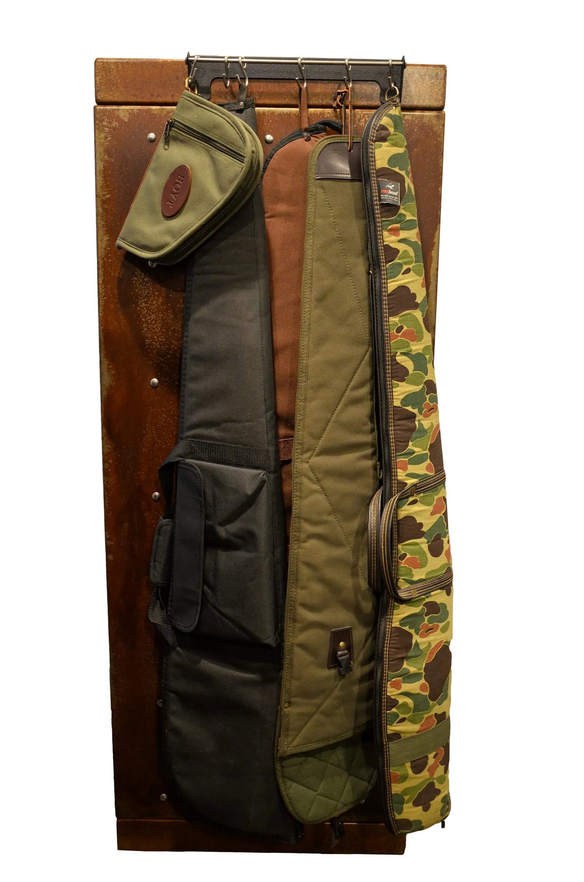Steelhead Compact Case Keeper Magnetic Safe Organizer with 4 rifles hanging in cases