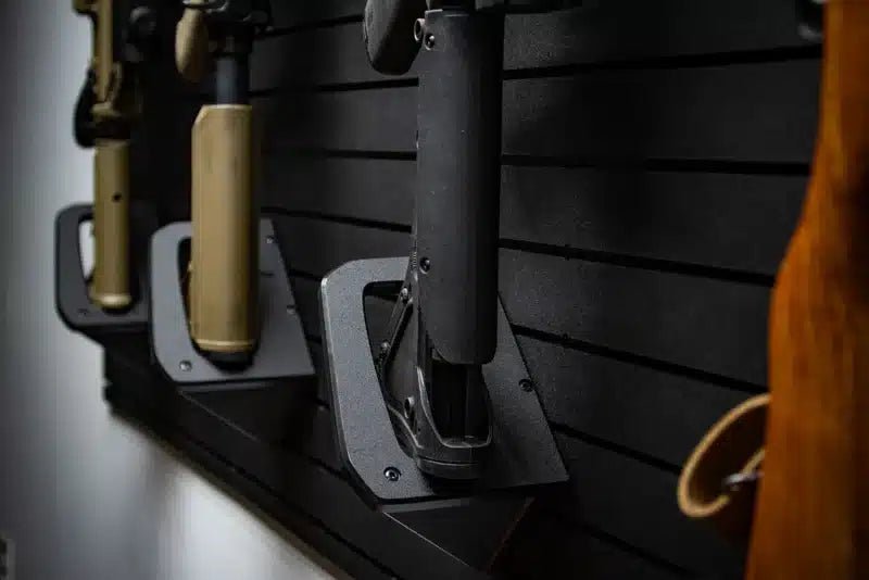 Tactical Walls ModWall Sideways Vertical Rifle Rack mounted on ModWall panel holding a single long gun horizontally