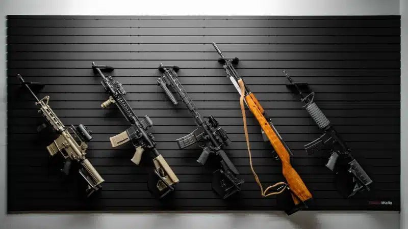 Five rifles displayed on a ModWall with a focus on design and color variation.