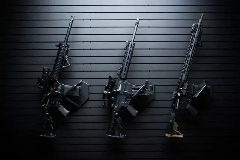 Three rifles displayed against a ModWall Panel