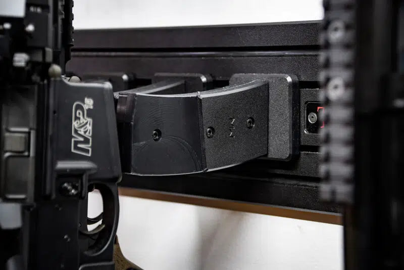 Close-up of a firearm with a magazine attached