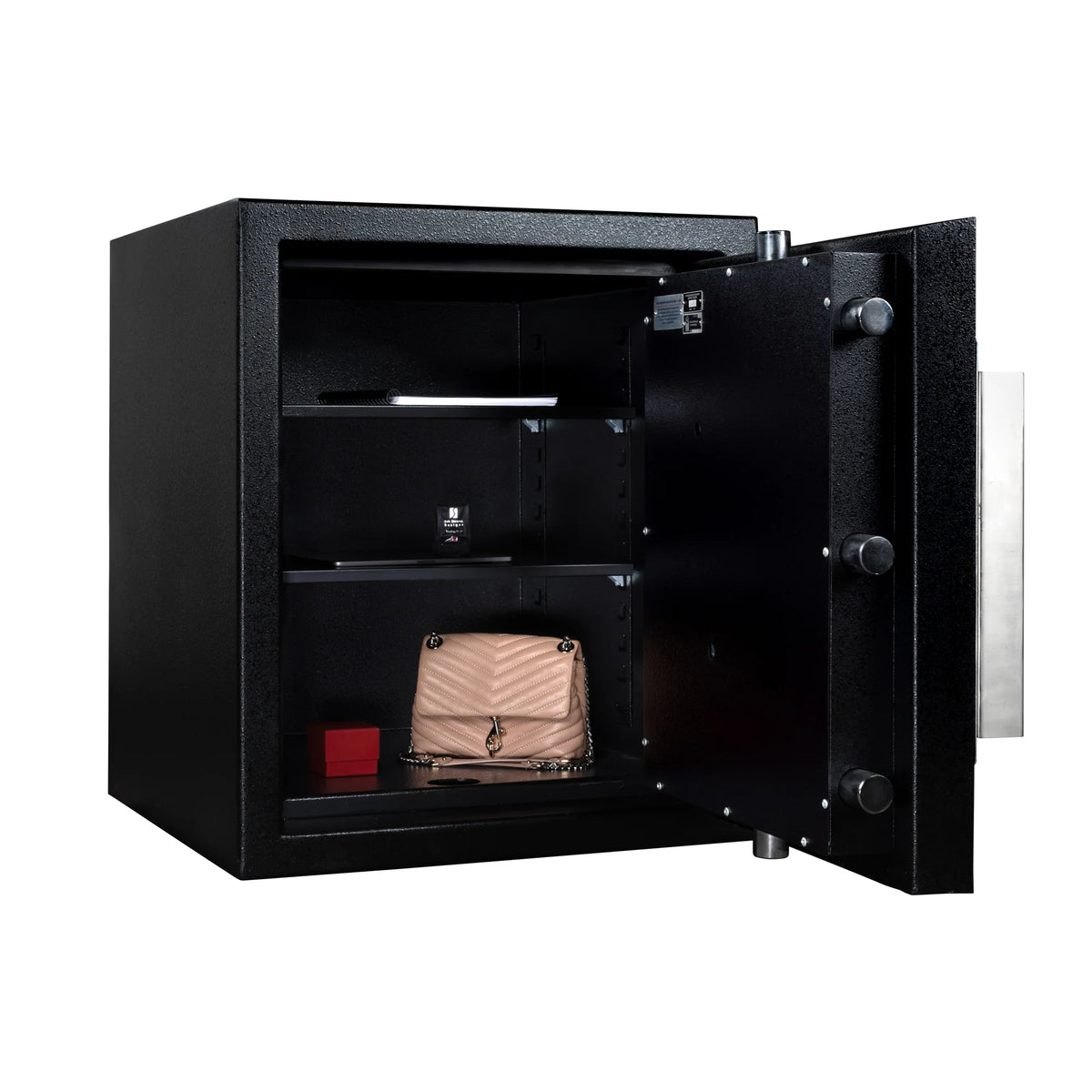 Stealth DeVault DVX-2420 TL-30X6 safe with door open from angle showing two adjustable shelves holding jewelry and a handbag