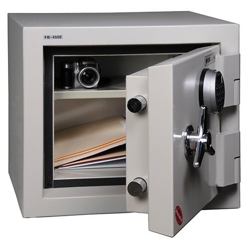 Hollon FB-450E fire and burglary safe in grey-white with door fully open showing the interior compartment with one adjustable shelf, two 1.5-inch chrome moving front locking bolts on the door edge, 1-inch vertical locking bar along the hinge side of the door, heavy-duty vault-style hinges, and pre-drilled bottom anchor hole for concrete floor mounting