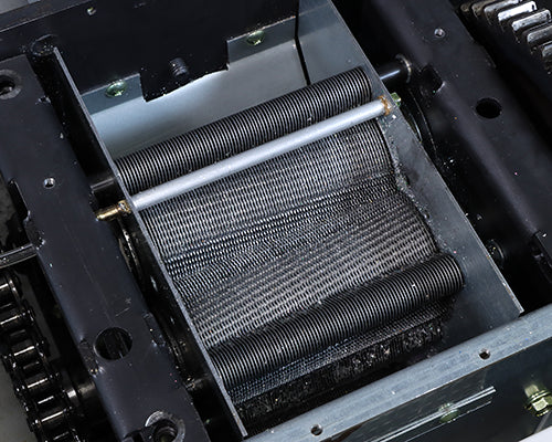 Formax FD-8714HS internal cutting head showing geared chain-driven cylindrical cutter shafts with fine teeth for shredding CDs, DVDs, and Blu-ray discs into 2mm particles