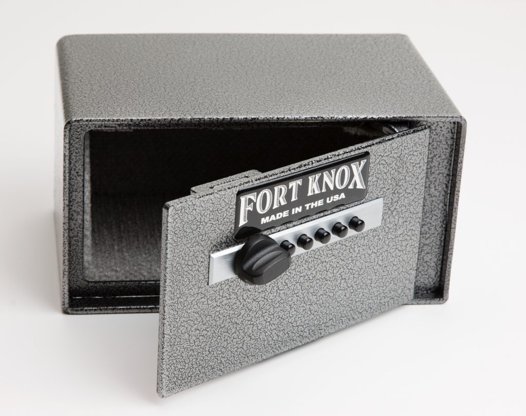 Fort Knox Auto Pistol Safe (FTK-Auto) in silver hammertone finish with the front door swung open to the right showing the empty interior compartment sized to hold a full-size auto pistol, Simplex pushbutton mechanical lock and turn knob on the door face, and heavy-gauge steel body construction