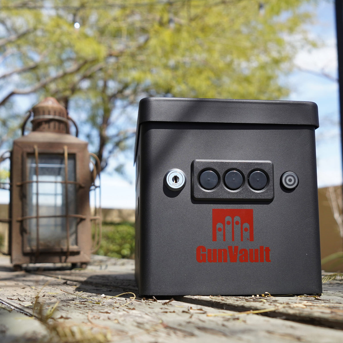 GunVault GVRV100BK22 Range Vault Handgun Safe On Deck next to lantern