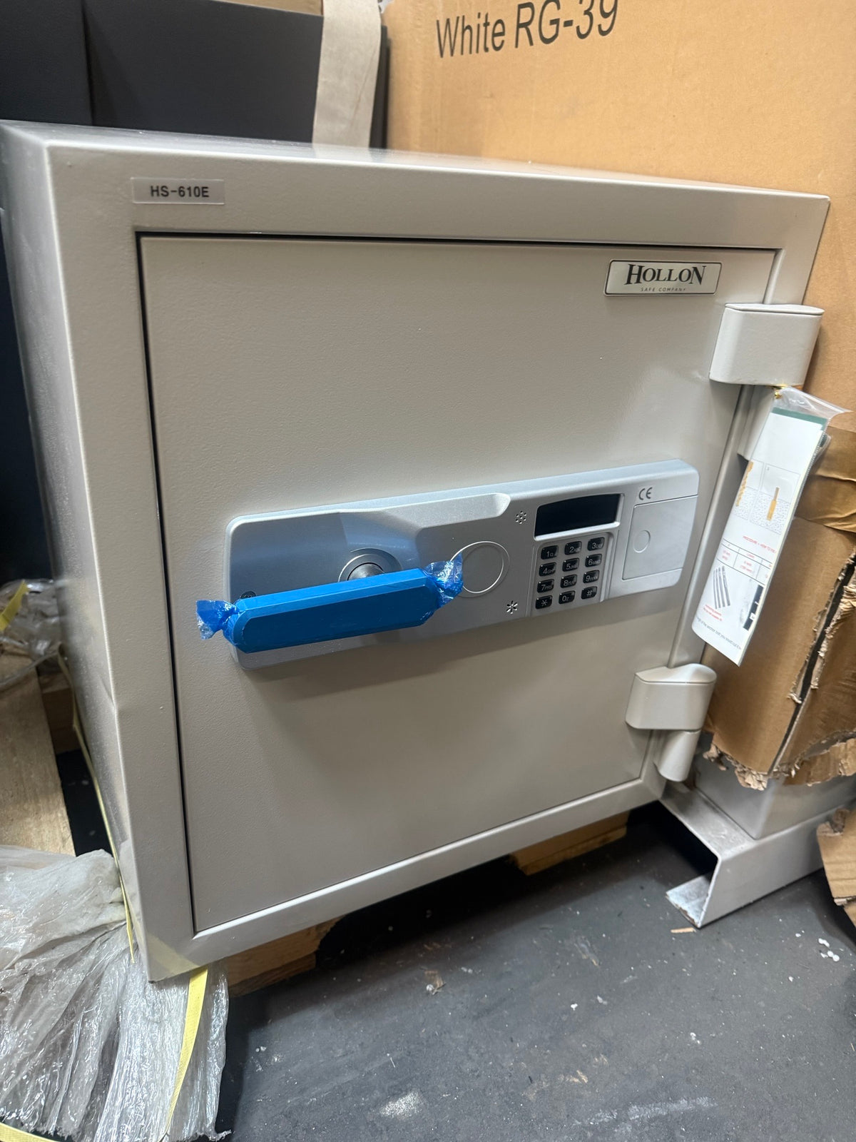 Blemished Hollon HS-610E front left view with blemishes visible on left side of safe and top left corner on front of safe. 