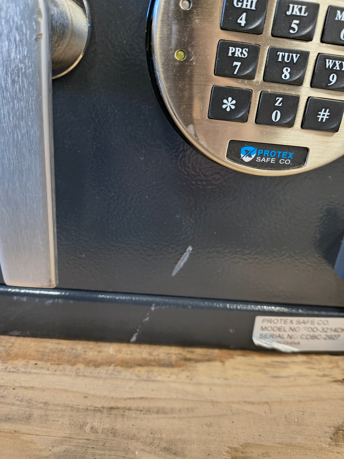 Blemished Protex FDD-3214 II blemish on bottom edge on front of safe. 