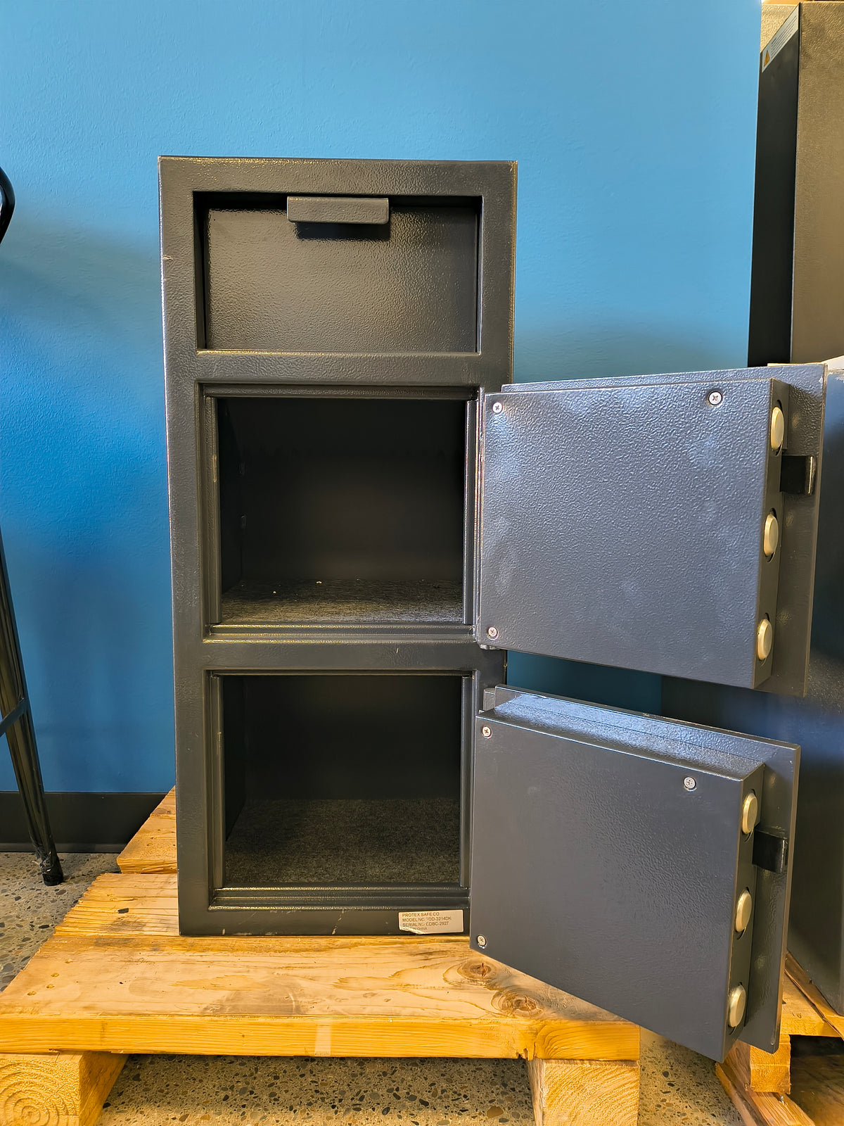 Blemished Protex FDD-3214 II damage to back top right corner of safe where the steel has split causing a potential security vulnerability. 