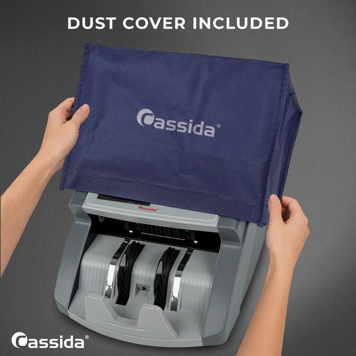 Cassida CRS 1000 dust cover included, shown as a hand places the blue Cassida-branded cover over the bill counter