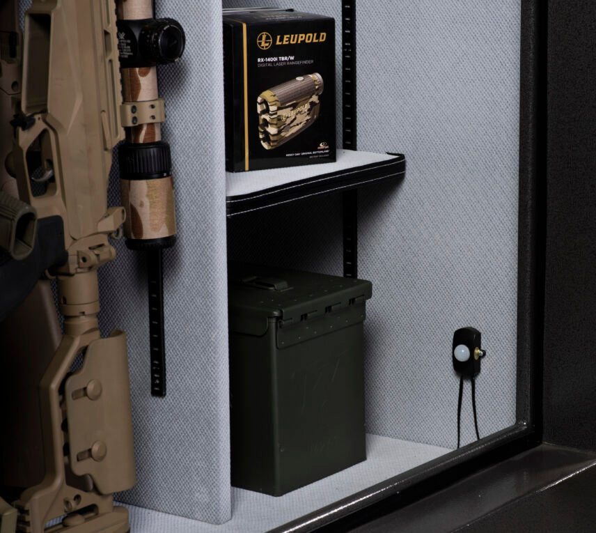 Winchester Legacy 53 Slate interior with an AR-style rifle in the barrel rack, Leupold rangefinder box, and green ammo can