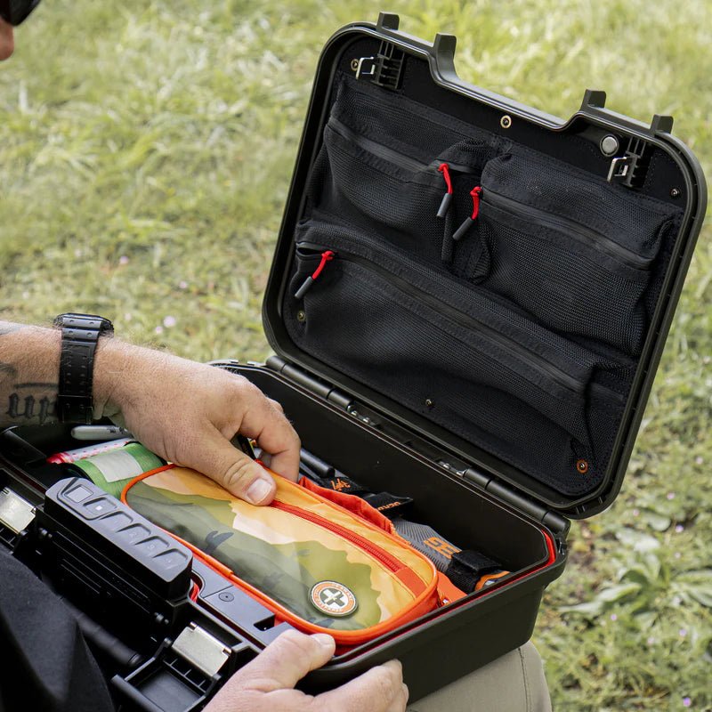 Vaultek LifePod XE open outdoors with optional lid organizer mesh pockets and accessory pouch