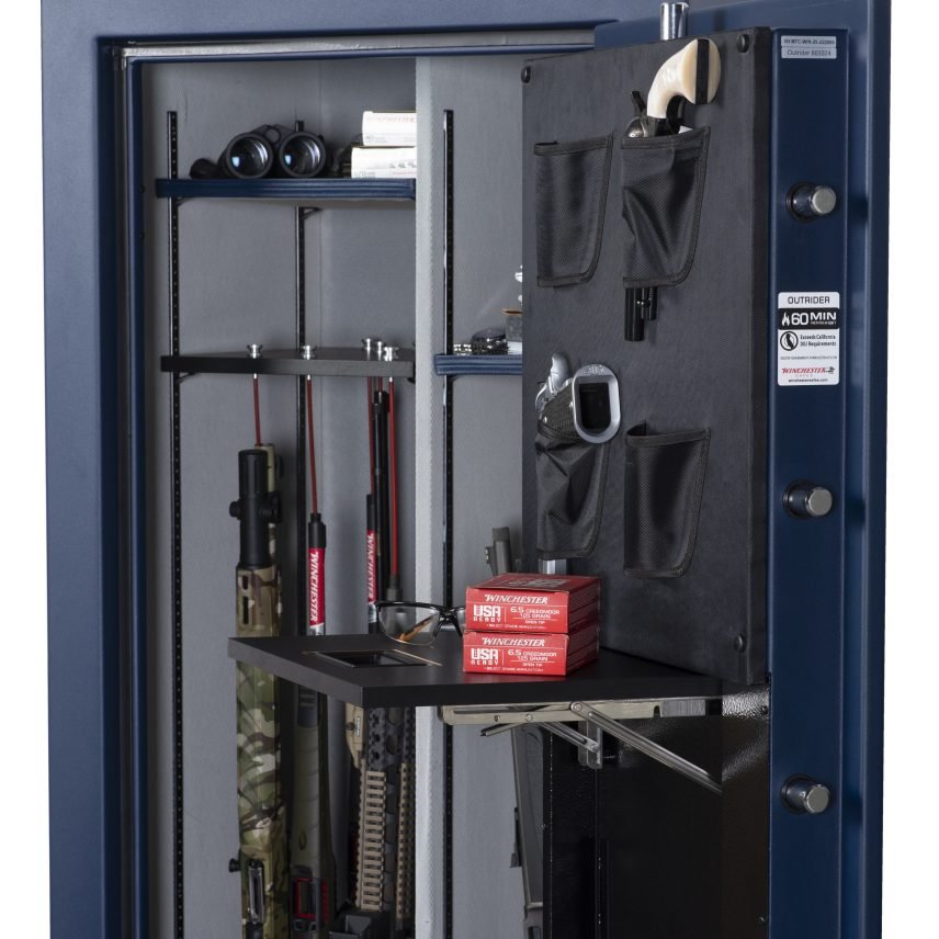 Winchester Outrider 25 interior with retractable utility shelf holding Winchester ammo above a scoped tactical rifle