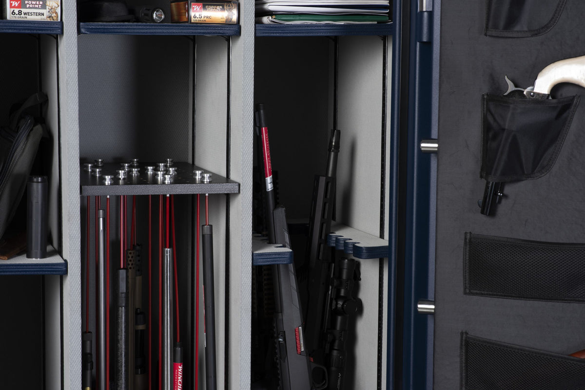 Interior view of the Winchester Outrider 41 with GunStiXX plate, tactical rifles, ammo shelves, and door organizer