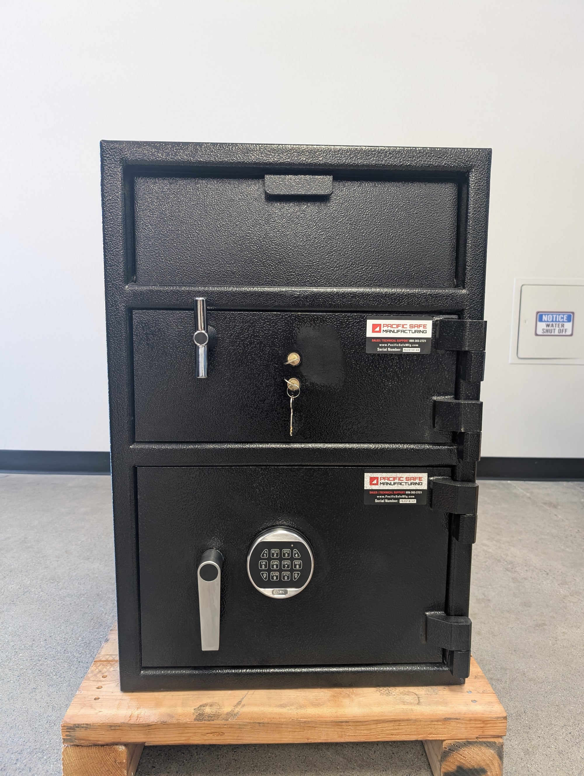 Blemished Pacific Safe FL30207TK2B View of the front of the safe with paint blemished visible on top door. 