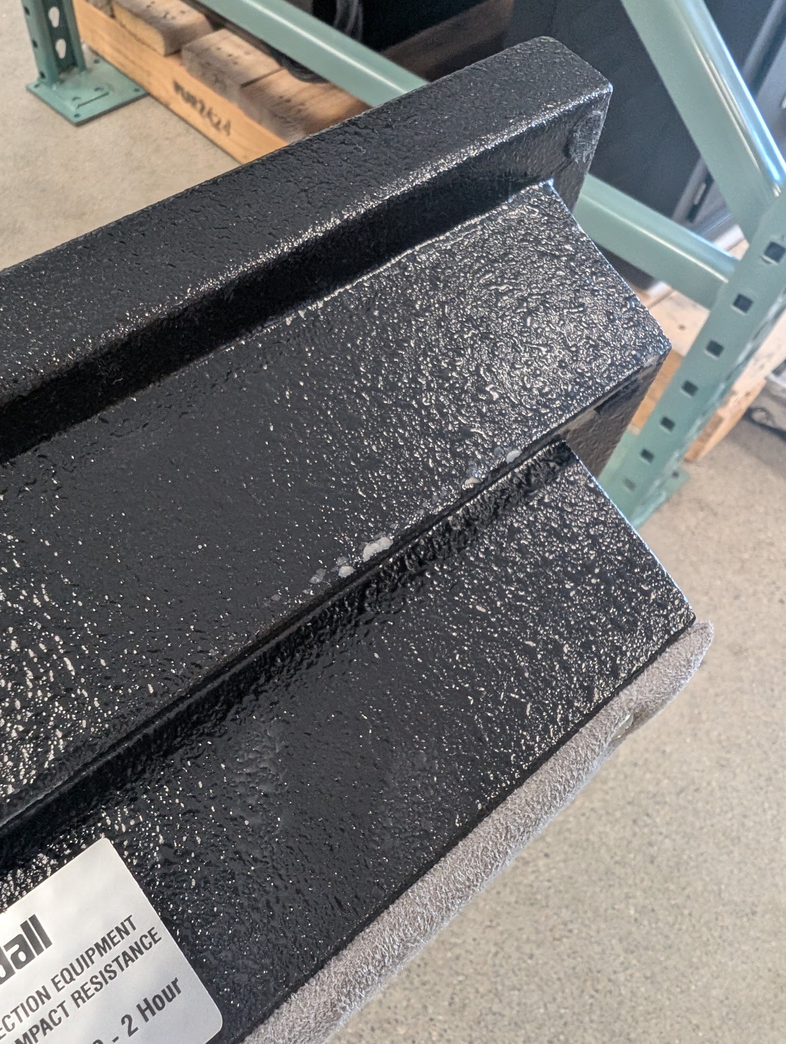 Front view of the safe. A few scratches are noticeable on the lower area of the safe. 