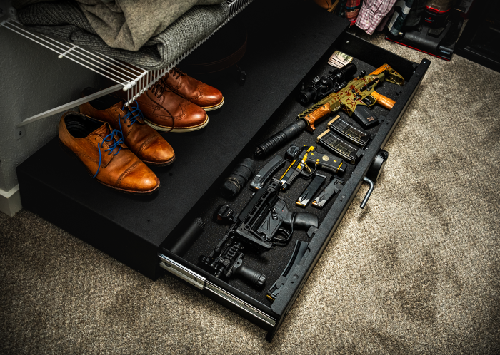 Steelhead Undercover 48E Under Bed Biometric Safe Open with rifles and handguns inside