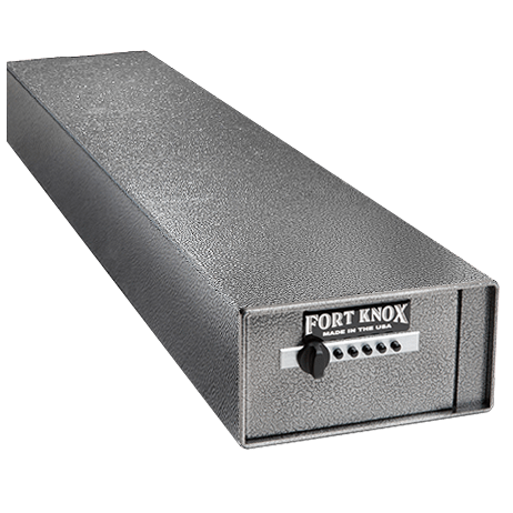 Fort Knox Shotgun Safe PB6 Security Box shown from a three-quarter angle in silver hammertone finish as a long horizontal rectangular steel box sized to store a shotgun horizontally, with a Simplex 5-button mechanical pushbutton lock and turn knob on the end-mounted drop-down door and "FORT KNOX MADE IN THE USA" nameplate